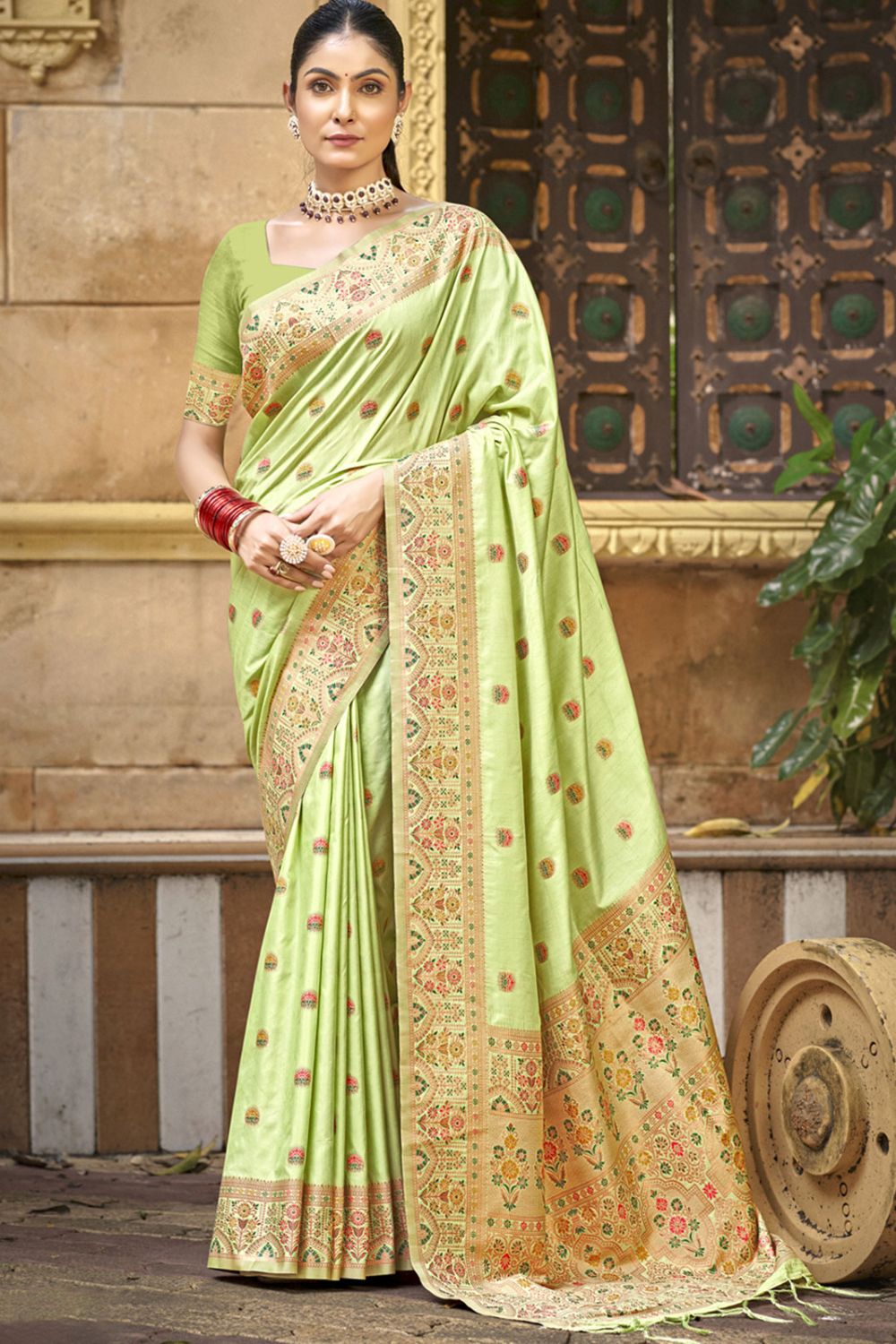 Pista Green Silk Woven Saree