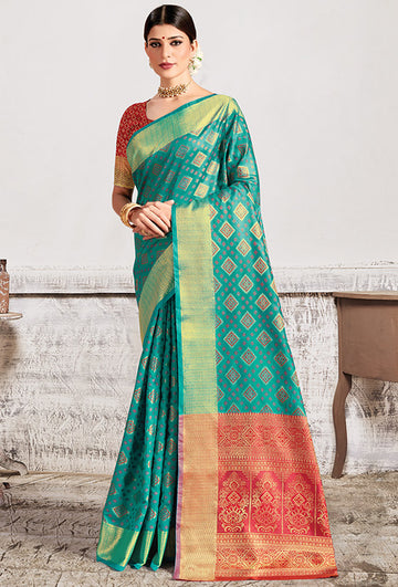 Rama Green Patola Silk Party Wear Saree with Contrast Blouse