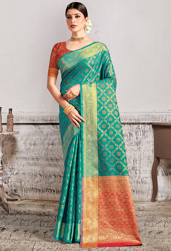 Rama Green Patola Silk Party Wear Saree with Contrast Blouse