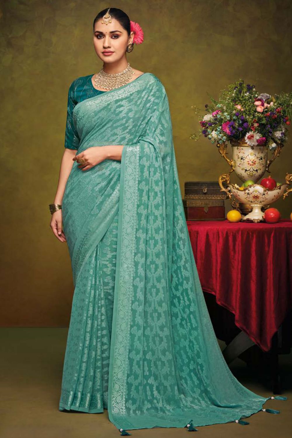 Turquoise Brasso Saree with Embroidered Blouse